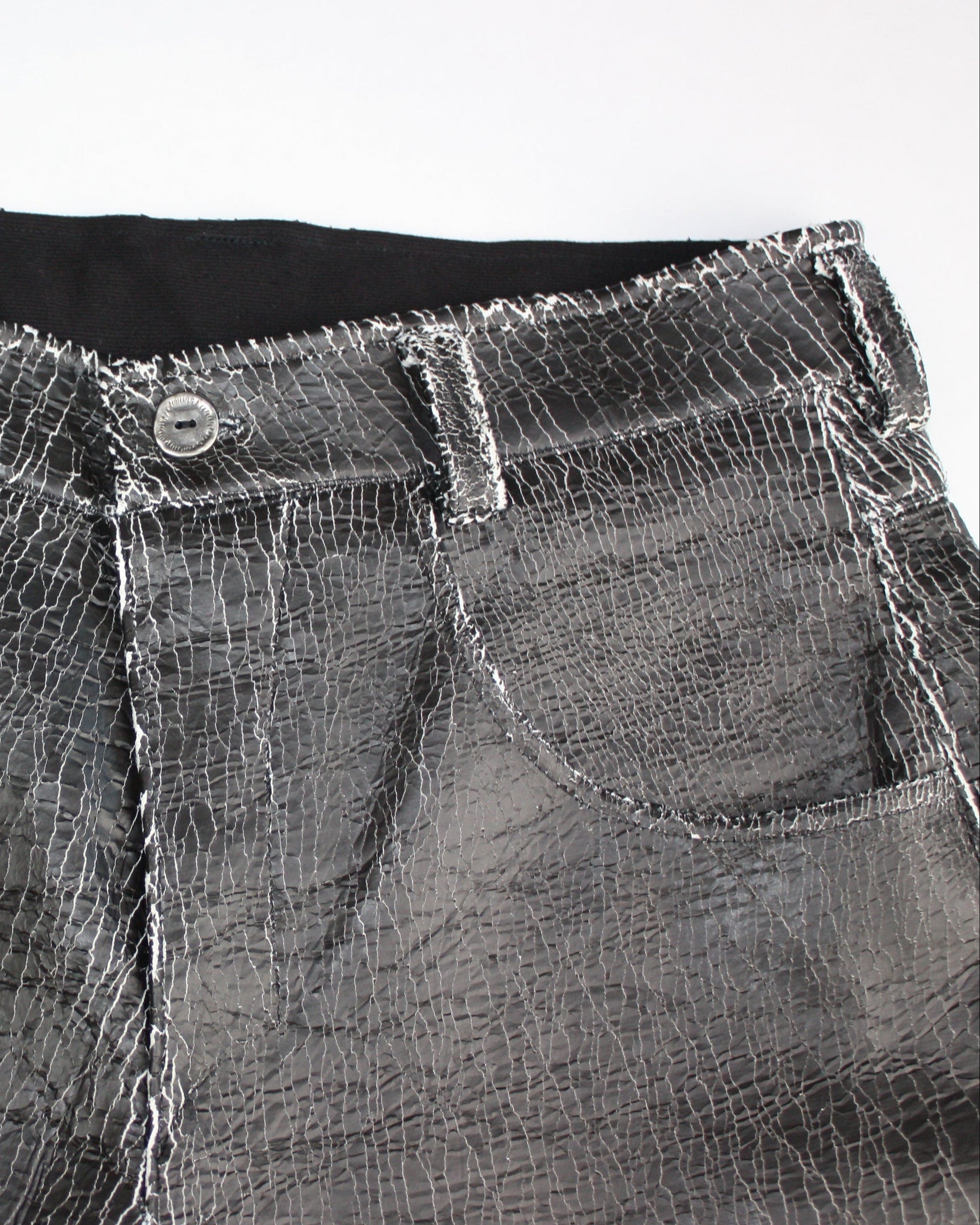 cracked leather pants