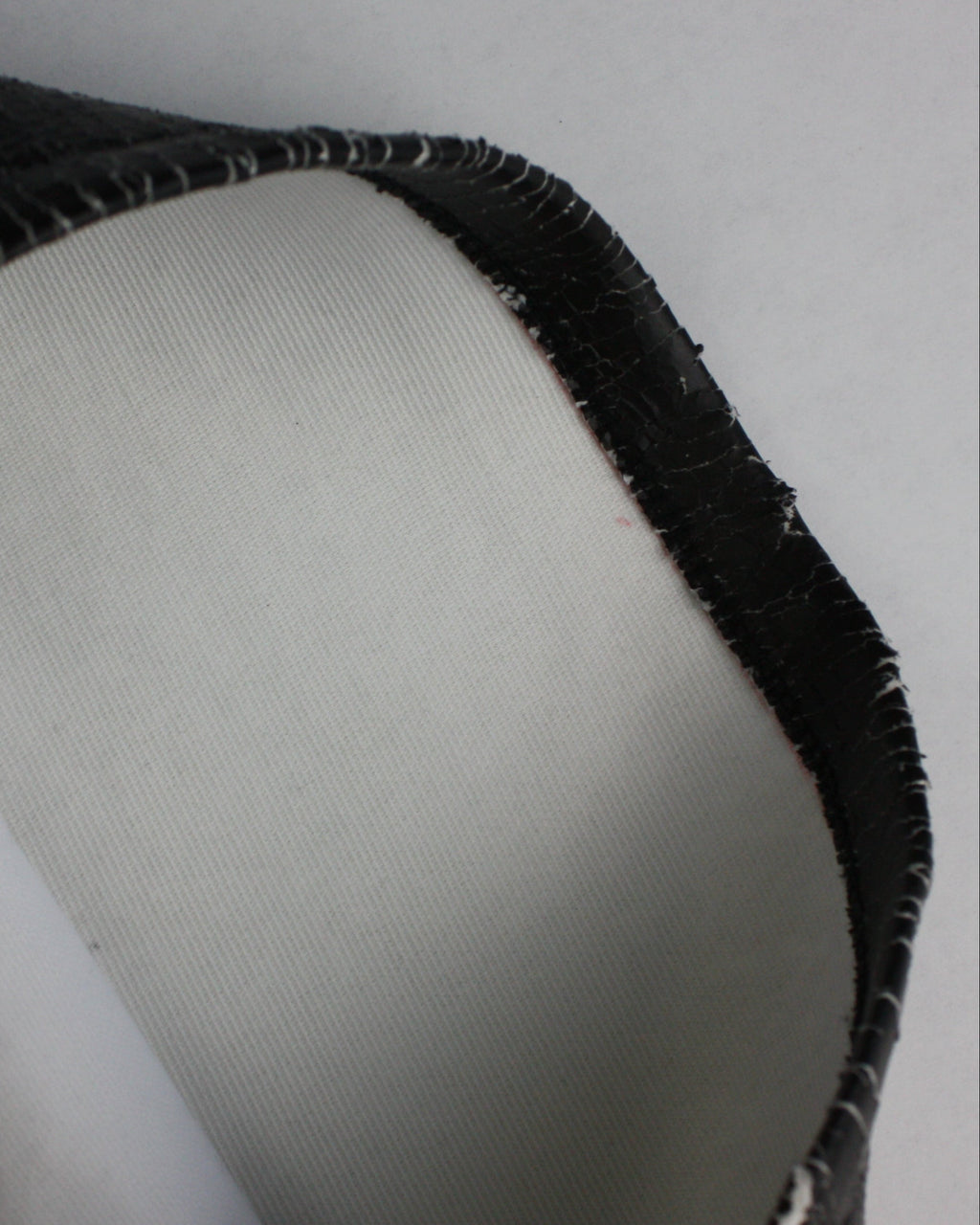 cracked leather pants