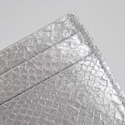 Cardholder salmon leather white — close crop of the upper corner, metallic salmon scale grain and stitched edge
